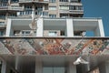 Modern buildings, architect. A pigeon flies near the building