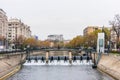 The modern buildings at the banks of the Dambovita River and the bridge in the center of Bucharest City, Romania Royalty Free Stock Photo