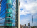 Modern buildings on cloudy sky background. London