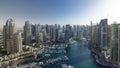 Modern buildings in Dubai Marina with shadows moving very fast timelapse, Dubai, UAE. Royalty Free Stock Photo