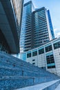 Modern buildings with glass facades and wide staircase