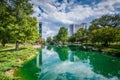 Modern buildings and lake at Marshall Park, in Uptown Charlotte, North Carolina.