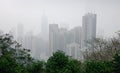 Modern buildings at misty day in Hong Kong