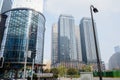 Modern buildings in misty winter city