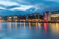 Modern buildings and offices on Liffey river in the morning in Dublin, Ireland Royalty Free Stock Photo