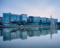 Modern buildings reflected in water at Lindholmen science park gothenburg,sweden Royalty Free Stock Photo
