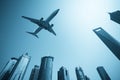 Modern buildings skyline with airplane Royalty Free Stock Photo