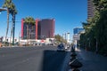 modern buildings with tinted glass walls of the Encore Wynn Resort and Casino on Las Vegas Blvd, The Strip, in sunlight under a