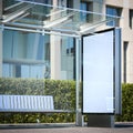 Modern bus stop with blank billboard. 3d rendering Royalty Free Stock Photo