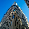 Modern business center. Blue windows. Facade of the building. Exterior of the office building.