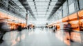 Modern business center with blurry movements of people. Fashionable glass light hall with walking business people