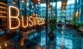 Modern business concept with Business text illuminated on a glass window against a blurred background of an upscale corporate Royalty Free Stock Photo