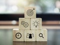 Modern business icons on wooden cube blocks. Royalty Free Stock Photo