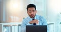 A modern business man feeling sick with covid fatigue while working online at a desk on his laptop. Closeup of an male Royalty Free Stock Photo