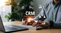 Modern Business Man Using CRM Software on Laptop for Customer Relationship Management Success Royalty Free Stock Photo