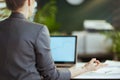 Modern business owner woman in green office meditating Royalty Free Stock Photo