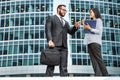 Modern business. Business team brainstorming. Successful business man and young woman communicating Royalty Free Stock Photo