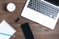 Modern business tools on a brown wooden background