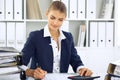 Modern business woman or confident female accountant in office. Student girl during exam preparing. Audit, tax service Royalty Free Stock Photo