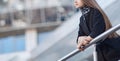 Modern business woman standing near modern office building Royalty Free Stock Photo