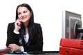 Modern business woman talking phone sitting at office desk Royalty Free Stock Photo