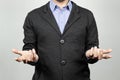 a modern businessman doing a confused expression with his hands and a white background Royalty Free Stock Photo