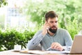 Modern Businessman Speaking by Phone at Work Royalty Free Stock Photo