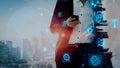 Modern Businessman Using Smartphone with Digital Technology Icons Representing Connectivity and Innovation in Urban Royalty Free Stock Photo