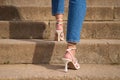 Modern businesswoman working woman close up legs walking up the stairs in modern city in rush hour to work in office a hurry. Royalty Free Stock Photo