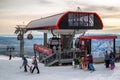 Modern cableway and skiers in resort Tatranska Lomnica, High Tat