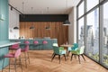 Modern cafe interior with turquoise and pink chairs, large windows overlooking the city, wooden elements, and natural light. 3D Royalty Free Stock Photo