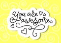 Modern calligraphy lettering of You are awesome in black with white outline on yellow background
