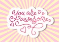 Modern calligraphy lettering of You are awesome in pink with white outline on backdrop with pink rays