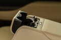 Modern car cup holder for rear seats row. Royalty Free Stock Photo