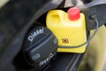 Modern car details closed fuel cap with Diesel text marking and small canister