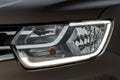 Modern car headlight close up view. Royalty Free Stock Photo