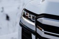 Modern car headlight close up view. Royalty Free Stock Photo