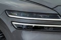 Modern car headlight close up view. Royalty Free Stock Photo