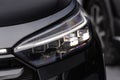 Modern car headlight close up view. Royalty Free Stock Photo