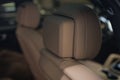 New modern car interior detail. Leather headrest. Royalty Free Stock Photo