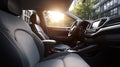 Modern car interior with front seats and dashboard in sunlight Royalty Free Stock Photo