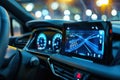 Modern car interior with a sleek dashboard, illuminated controls, and a digital navigation screen in focus