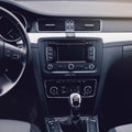 Modern car interior. Steering wheel, dashboard, speedometer, display. Royalty Free Stock Photo