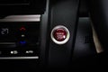 Modern car interior technology red start and stop button Royalty Free Stock Photo