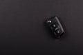 Modern Car Keys, with three electronic remote buttons, Folded.isolated on black background. Royalty Free Stock Photo