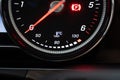 Modern car lit water or coolant temperature meter digital dial. Close up shot, rev meter above, no people Royalty Free Stock Photo