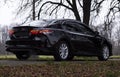 Modern car moving at the country side background Royalty Free Stock Photo