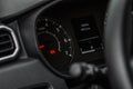 Modern car tachometer and dashboard with backlight. Royalty Free Stock Photo
