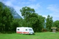 Modern caravan at the campsite in the mountains