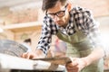 Modern Carpenter Measuring wood